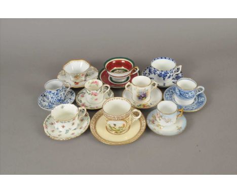 A collection of assorted teacups, coffee cans and saucers late 19th/mid-20th century to include a lemon-ground coffee cup and