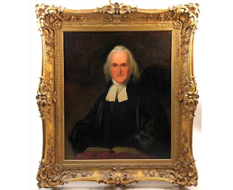 British school, 19th century, Portrait of a vicar, half length, oil on canvas, 91 x 77cm