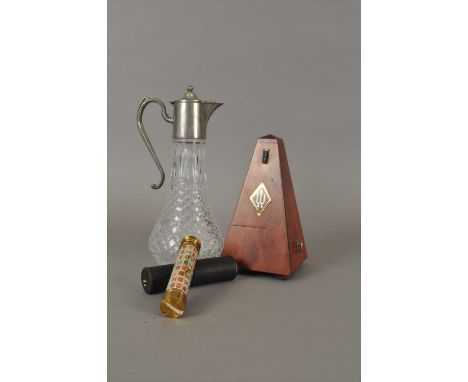 A Wittner (West German-made) wooden cased metronome, together with a brass two-draw telescope and a pressed glass claret jug 