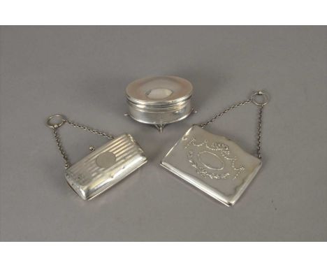 A silver purse, Henry Matthews, Birmingham 1913, with attached chain, together with a further silver purse, Henry Matthews, B