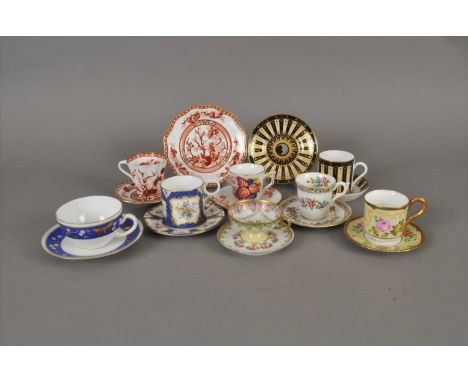 A small group of teacups, coffee cups, saucers and sideplates including Coalport 'Indian Tree Coral', 'Royal Worcester Celebr