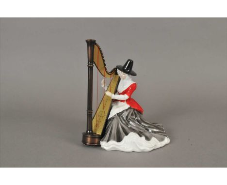 A Royal Doulton Welsh Lady - Telynores a limited edition numbered 1006 of 1250, model number HN4968, the lady seated playing 