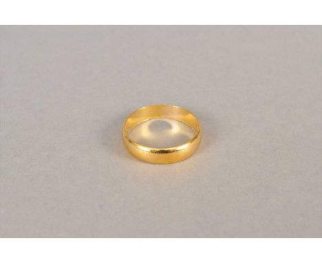 A 22ct gold wedding band, hallmarked Birmingham 1992, ring size J, weight approx 2.9g