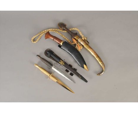 Three reproduction WW2-style Commando Fighting Knives, one with brown leather sheathe and another by William Rodgers of Sheff