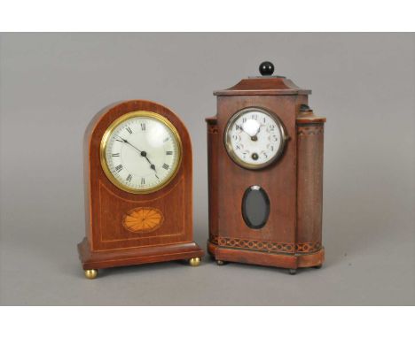 A Victorian mantle clock, with an opaque glass dial populated with black Roman numerals and hand painted floral swags, set wi