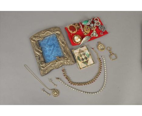 A collection of costume jewellery, to include; paste necklaces, simulated pearls, a silver stone set bangle, a cameo brooch, 