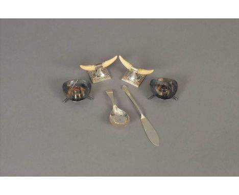 A pair of Edwardian silver and ivory mounted knife rests, Birmingham 1904, together with a silver butter knife, a silver cadd