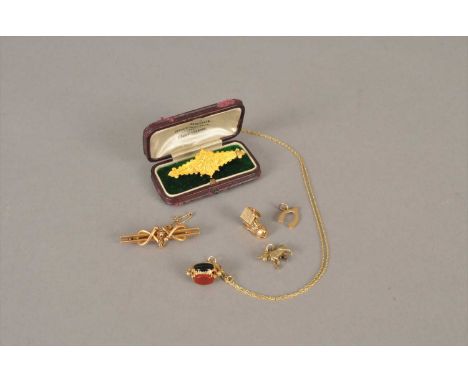 A 9ct gold bar brooch with horseshoe and floral decoration, together with a diamond set bar brooch stamped '9c', a 9ct gold h