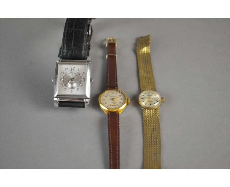 A gentlemans Rotary Revelation quartz wristwatch with original box and papers together with a ladies Newmark watch and Anker 