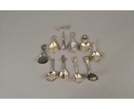 A collection of eight silver caddy spoons, to include; a commemorative example to celebrate the silver jubilee, London 1977 a