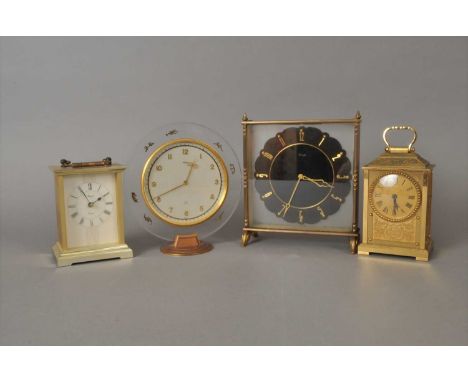 Four assorted 20th century mantle clocks to include a ImHof example, the perspex border decorated with signs of the Zodiac, r