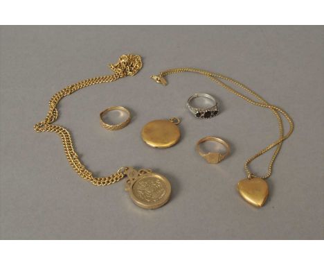 A small collection of jewellery, to include; a 9ct gold Celtic style band, a 9ct gold signet ring, a yellow metal plain polis