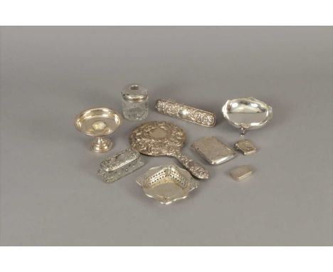 A small collection of silver, comprising; a silver mounted mirror, a silver mounted brush, two silver topped glass jars, a pe