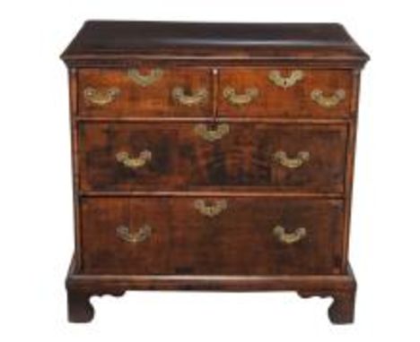 A walnut chest of drawers, first quarter 18th century and later, the crossbanded rectangular top with central oval and moulde