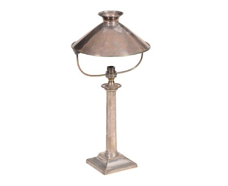 A silver plated table lamp , with swivel silver shade, 47cm high A silver plated table lamp , with swivel silver shade, 47cm 