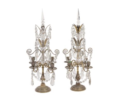 A pair of cut glass and gilt metal four light candelabra in Louis XV taste   A pair of cut glass and gilt metal four light ca