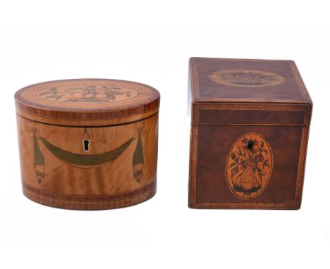 A George III satinwood and marquetry tea caddy, circa 1780, of oval section   A George III satinwood and marquetry tea caddy,