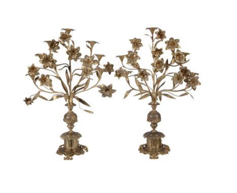 A pair of French gilt brass seven light candelabra, circa 1880 A pair of French gilt brass seven light candelabra, circa 1880