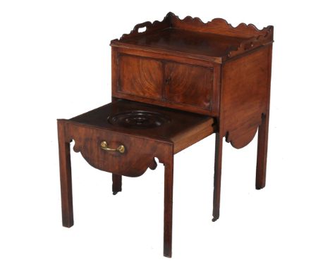 A George III mahogany night commode, circa 1770   A George III mahogany night commode,   circa 1770, with pull out drawer con
