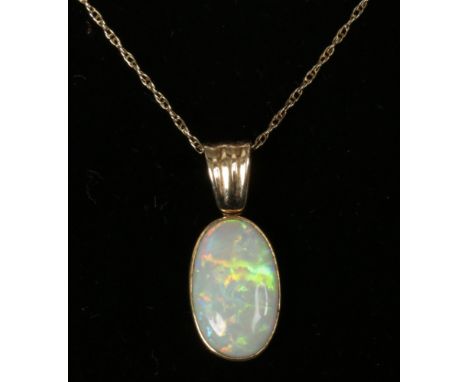 A 9ct opal pendant and chain. 