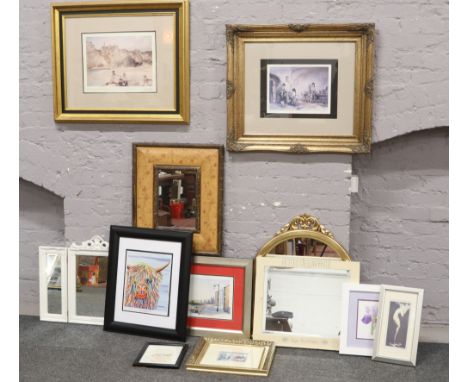 A collection of framed pictures and mirrors to include Steven Brown limited big malky cow print, limited edition Gainsborough