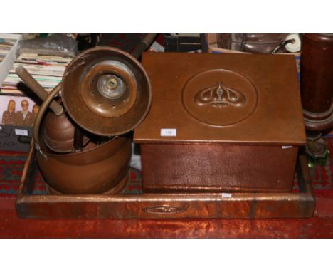 A copper log box, copper fire fender helmet shaped coal bucket, ornamental miners lamp etc. 