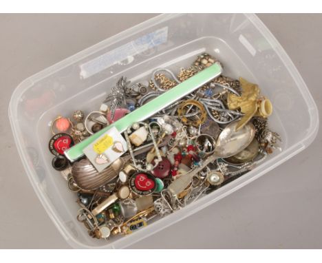 A box of collectables including caddy spoons, costume jewellery and badges etc. 