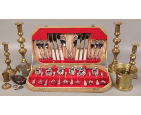 A collection of metalwares and collectables to include brass candlesticks E. McClarence Ltd cutlery, hip flask etc. 