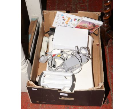 A Wii console with Wii fit balance board, controller and sensor. 