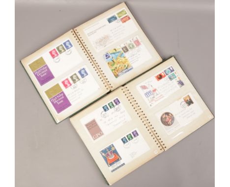 Stamps; two albums of consecutive first day covers, stamped addressed envelopes 1951 - 1973. 