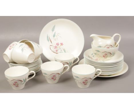 A collection of J &amp; G Meakin studio ware teawares in the Meadow Lane design, approximately 34 pieces. 