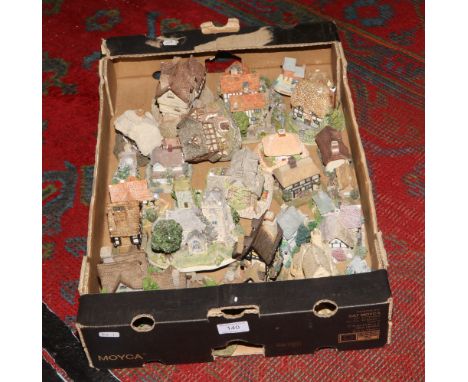 A box of ceramic ornamental houses to include David Winter, Lilliput Lane, Leonardo examples. 