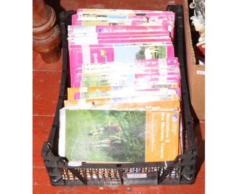 A box of ordnance survey maps. 