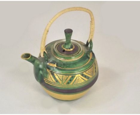 MARY RICH.
A porcelain miniature teapot by Mary Rich. Impressed mark.