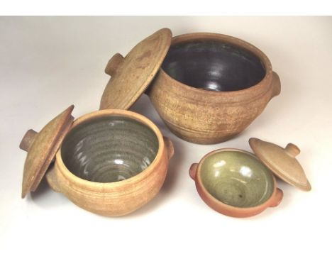 LEACH STANDARD WARE.
A large & a small lidded stew pot & a lidded soup bowl. Pottery marks.