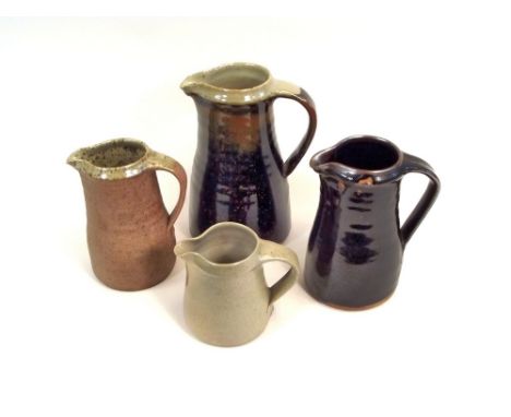 LEACH STANDARD WARE.
Four jugs, largest of 3 pint size. Pottery marks. Minor faults and/or damage to some pieces.