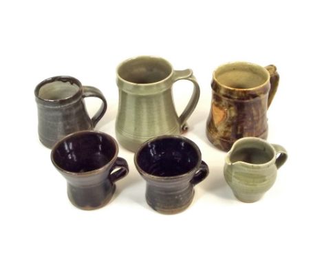 LEACH STANDARD WARE.
Three mugs, a small jug & two tankards, one with rifle club badge. Pottery marks. Minor faults and/or da