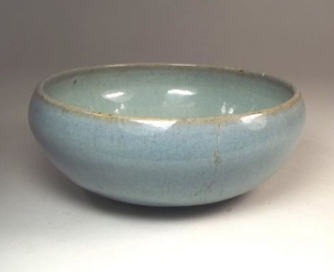 BERNARD LEACH.
A Bernard Leach chun glazed footed bowl. Damage: two cracks & some crazing. Diameter 18cm. Personal & Leach Po