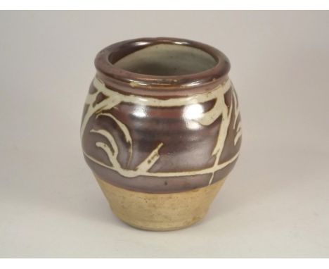 LEACH POTTERY.
A Leach Pottery jar. Decoration possibly by Bernard Leach? Height 11.5cm. Leach Pottery mark only. 