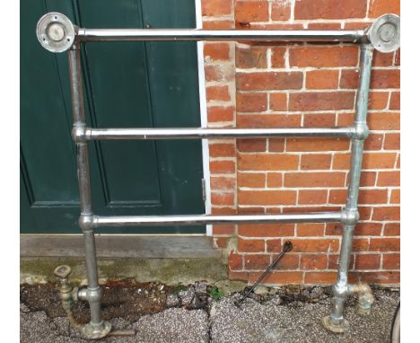 A vintage metal towel rail