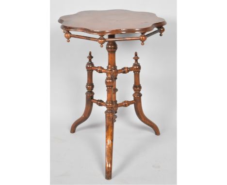 An Oriental Shaped Circular Topped Occasional Table on Tripod Base with Turned Stretchers, 49cm Diameter 