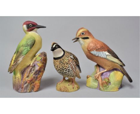 A Royal Worcester Jay 3248, Woodpecker 3249 and a Beswick Bobwhite Quail 