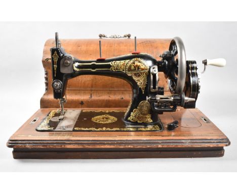 A Vintage Cased Sewing Machine 