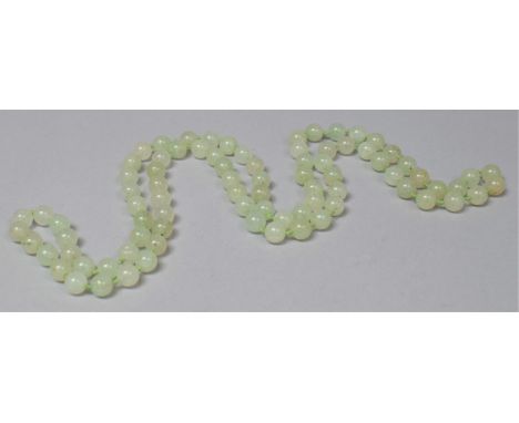 A Jade Bead Necklace, 72 cms long 