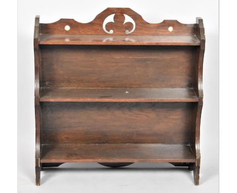 An Edwardian Oak Wall Hanging Shelf with Pierced Galleried Top, 59cm wide 