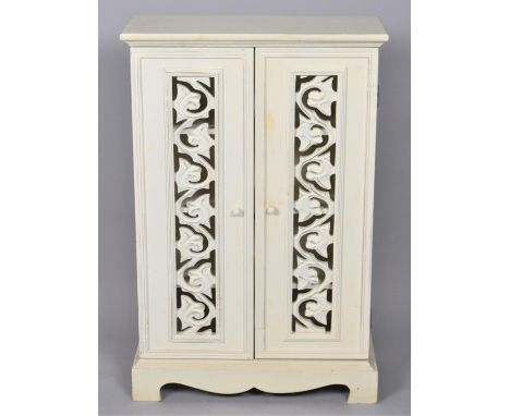 A White Painted Three Shelf Cabinet with Panelled Pierced Doors, 45cm Wide and 68cm high 