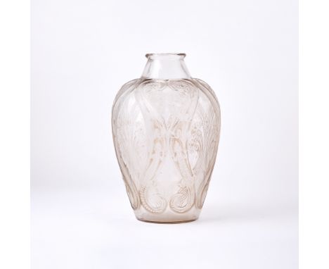 Marclihac no. 879, circa 1913-47Of tapering ovoid form, in colorless glass, the body molded with stylized lizards and foliate