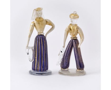 Vetreria Artistica Barovier & C., circa 1933-35Of a standing woman with a hand on her hip and holding a jug in her hand and a