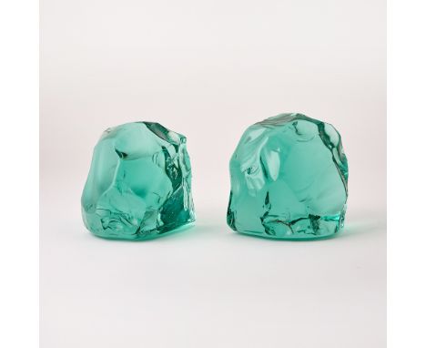 Model no. 1977, 1960sEach of 'chipped' form, in transparent 'bottle green' colored glass, with a polished finish, one bookend