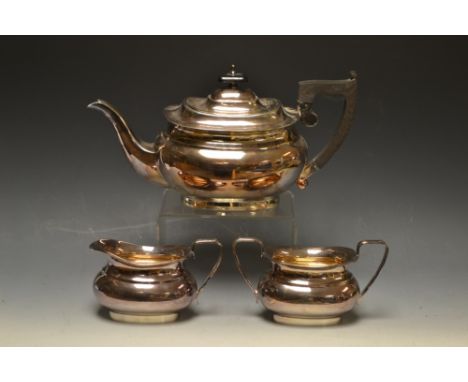 A Viners silver tea set, comprising teapot, sugar and cream, marked Sheffield 1964 and 1965 (3)